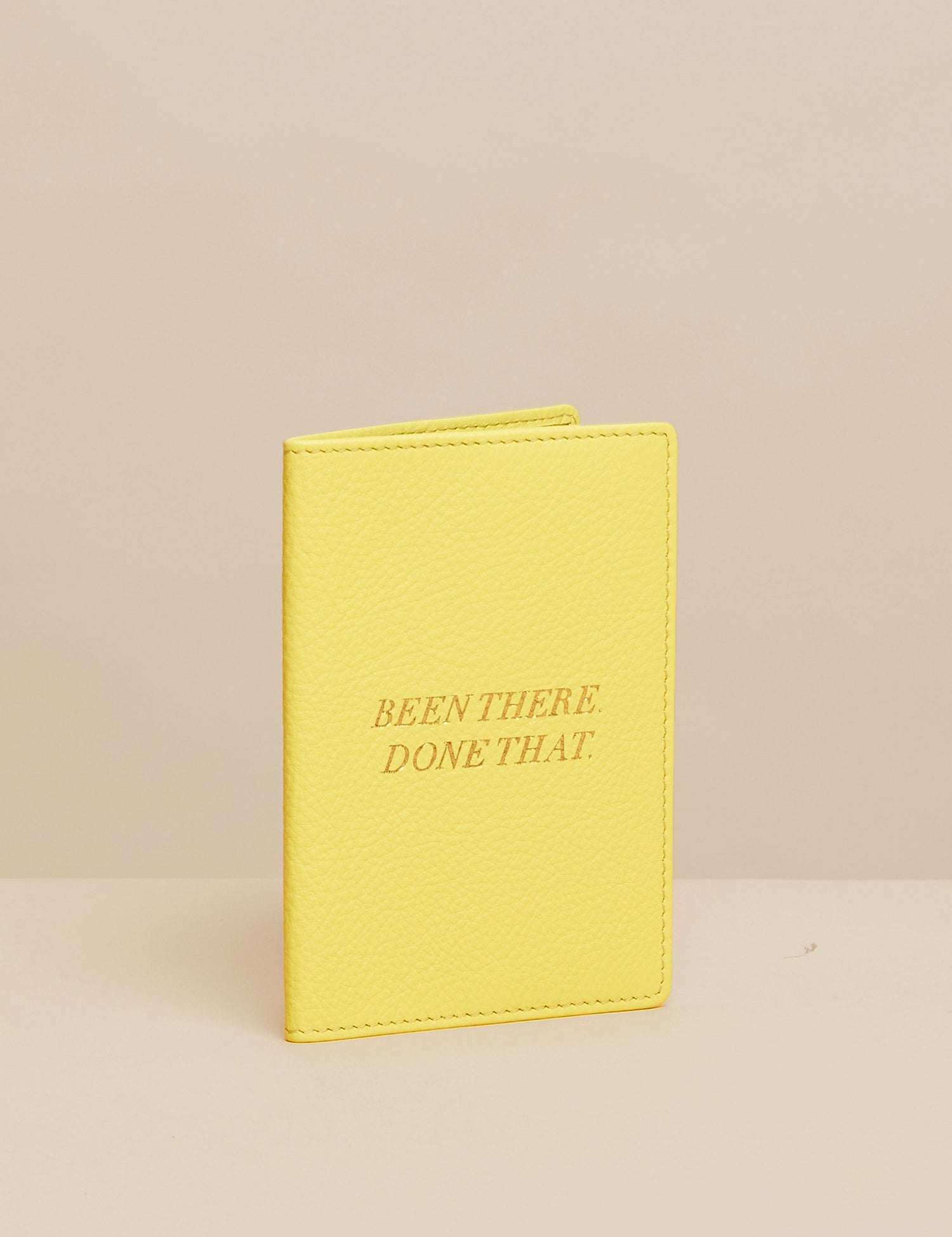yellow leather passport holder