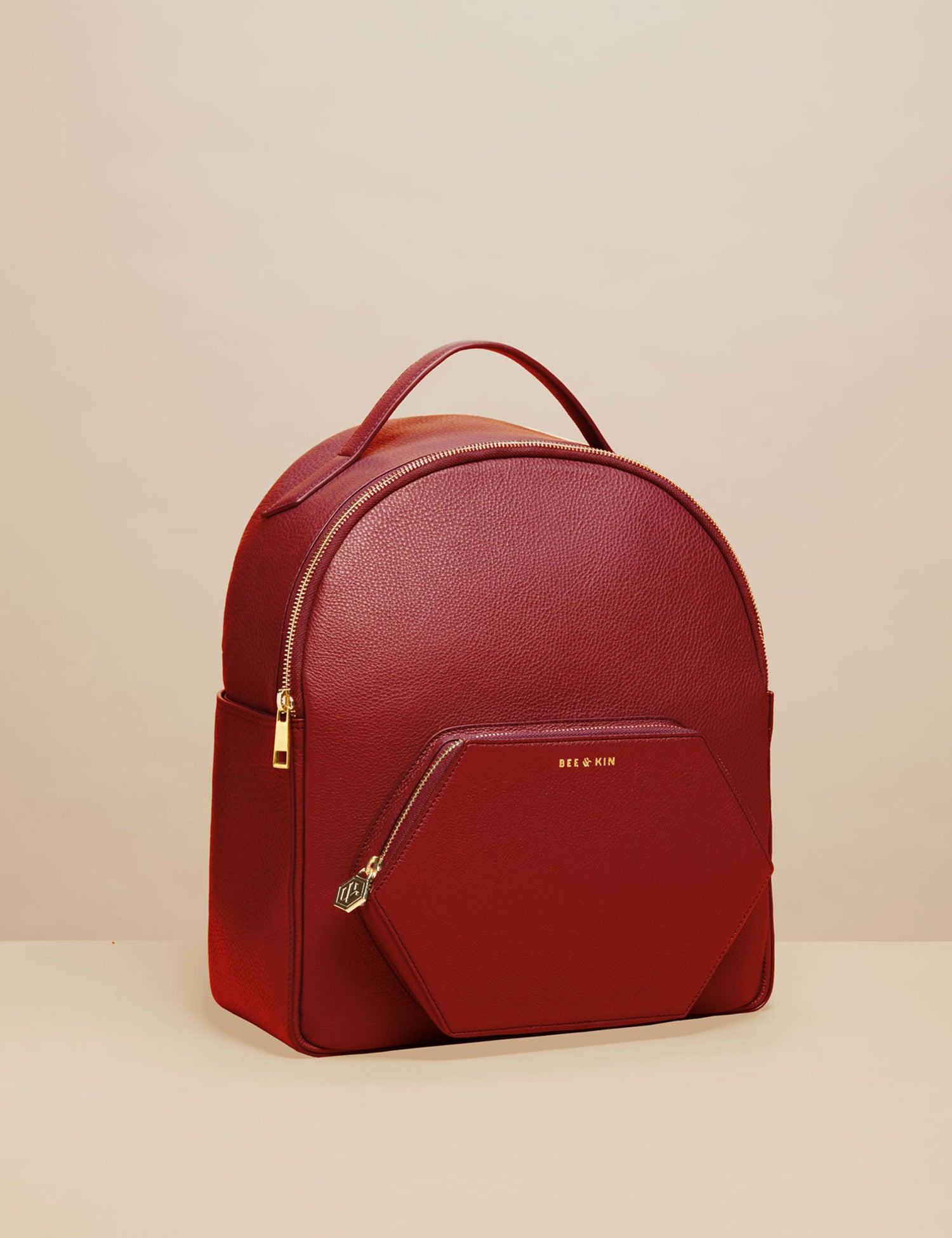 bee-kin-midi-backpack-red-side-1500x2000.jpg
